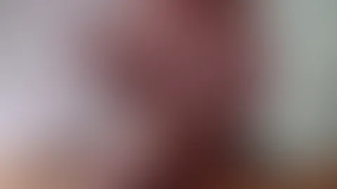 Naked with a vibrator