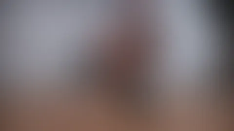 Füße in Nylons und High Heels