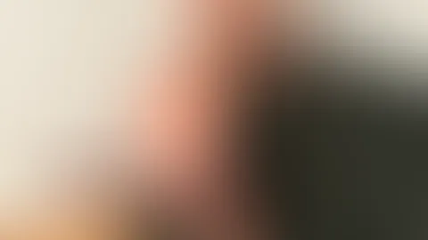 In meinem UnderboobsBH und Strapsen räkle ich mih auf dem Sessel
